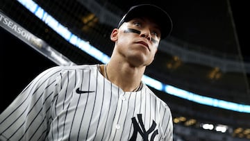 NEW YORK, NEW YORK - OCTOBER 07: Aaron Judge #99 of the New York Yankees looks on in the dugout before the game against the Toronto Blue Jays in game three of the American League Division Series at Yankee Stadium on October 07, 2025 in the Bronx borough of New York City. Al Bello/Getty Images/AFP (Photo by AL BELLO / GETTY IMAGES NORTH AMERICA / Getty Images via AFP)
