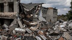 MYKOLAIV, UKRAINE - 2022/08/18: A Ukrainian soldier seen at the school destroyed by a Russian airstrike in Mykolaiv Oblast. Ukrainian forces have launched a counter-offensive in southern regions of the country, including in the Mykolaiv area close to the Black Sea. Russian forces responded with heavy shelling of  villages surrounding Mykolaiv city, causing significant damage and casualties. (Photo by Alex Chan Tsz Yuk/SOPA Images/LightRocket via Getty Images)