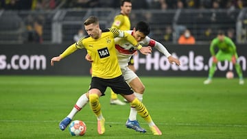 Dortmund&#039;s German forward Marco Reus (L) and Stuttgart&#039;s Japanese midfielder Wataru Endo vie for the ball during the German first division Bundesliga football match BVB Borussia Dortmund VfB Stuttgart in Dortmund, western Germany, on November 20