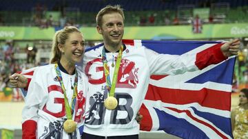 2016 Rio Olympics - Cycling Track - Victory Ceremony - Men's Keirin Victory Ceremony - Rio Olympic Velodrome - Rio de Janeiro, Brazil - 16/08/2016. Gold medalist Jason Kenny (GBR) of Britain poses with his gilfriend, women's omnium gold medalist