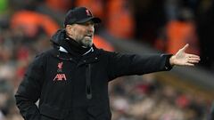 Liverpool's German manager Jurgen Klopp reacts during the English FA Cup third round football match between Liverpool and Wolverhampton Wanderers at Anfield in Liverpool, north-west England on January 7, 2023. (Photo by Oli SCARFF / AFP) / RESTRICTED TO EDITORIAL USE. No use with unauthorized audio, video, data, fixture lists, club/league logos or 'live' services. Online in-match use limited to 120 images. An additional 40 images may be used in extra time. No video emulation. Social media in-match use limited to 120 images. An additional 40 images may be used in extra time. No use in betting publications, games or single club/league/player publications. / 