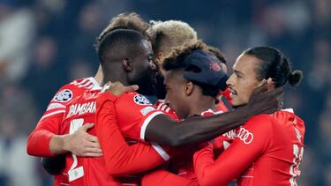 PARIS, FRANCE - FEBRUARY 14: Kingsley Coman of Bayern Munchen celebrates 0-1 with Dayot Upamecano of Bayern Munchen, Leroy Sane of Bayern Munchen during the UEFA Champions League match between Paris Saint Germain v Bayern Munchen at the Parc des Princes on February 14, 2023 in Paris France (Photo by David S. Bustamante/Soccrates/Getty Images)