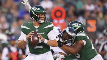 Zach Wilson #2 of the New York Jets throws a pass against Josh Sweat #94 of the Philadelphia Eagles in the first half of the preseason game at Lincoln Financial Field on August 12, 2022 in Philadelphia, Pennsylvania.