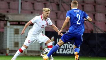 Zenica (Bosnia And Herzegovina), 07/09/2020.- Bosnia&#039;s Eldar Civic (R) in action against Poland&#039;s Kamil Jozwaik (L) during the UEFA Nations League soccer match between Bosnia and Poland in Zenica, Bosnia and Herzegovina, 07 September 2020. (Bosn