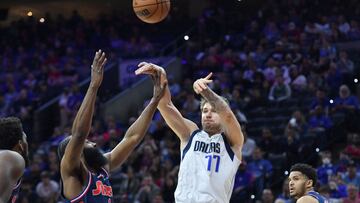 Mar 18, 2022; Philadelphia, Pennsylvania, USA; Dallas Mavericks guard Luka Doncic (77) passes the ball against Philadelphia 76ers guard James Harden (1) during the first quarter at Wells Fargo Center. Mandatory Credit: Eric Hartline-USA TODAY Sports