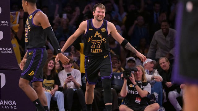 Mar 31, 2026; Los Angeles, California, USA; Los Angeles Lakers guard Luka Doncic (77) smiles after a dunk in the final minutes of the game against the Cleveland Cavaliers at Crypto.com Arena. Mandatory Credit: Jayne Kamin-Oncea-Imagn Images