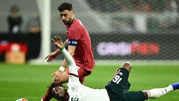 Portugal's midfielder #08 Bruno Fernandes and Mexico's forward #16 Julian Quinones fight for the ball during a friendly football match between Mexico and Portugal at the Banorte (formerly known as Azteca) Stadium in Mexico City on March 28, 2026. (Photo by CARL DE SOUZA / AFP)