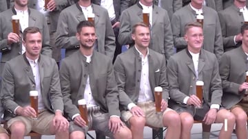 Covid might crash the party, but it won't crash their spirits. The Bayern Munich team looks content in lederhosen and holding up beer in their team photo.