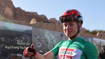Lotto Soudal's Maxim Van Gils poses for a picture after winning the Saudi Tour in Saudi Arabia's northwestern city of al-Ula on February 5, 2022. (Photo by Thomas SAMSON / AFP)