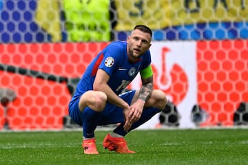 Slovakia's defender #14 Milan Skriniar reacts during the UEFA Euro 2024 Group E football match between Slovakia and Ukraine at the Duesseldorf Arena in Duesseldorf on June 21, 2024. (Photo by INA FASSBENDER / AFP)