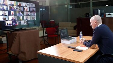 Las Rozas (Spain), 25/03/2020.- A handout photo made available by the Royal Spanish Soccer Federation (RFEF) shows the federation's president, Luis Rubiales (R), during a video-conference meeting with the heads of regional soccer federations in Las R