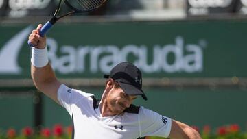 Andy Murray gives his racket the treatment at Indian Wells.