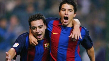 Saviola y Xavi.