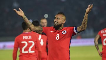 Chile's Arturo Vidal celebrates his goal against Burkina Faso during a friendly match for the FIFA Confederations Cup Russia 2017, in Santiago, on June 2, 2017. / AFP PHOTO / MARTIN BERNETTI