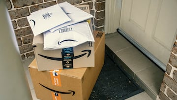 Sydney, Australia - 2021-12-03 Amazon prime boxes and envelopes delivered to a front door of residential building. Black Friday Cyber Monday Christmas Sale Prime Day. Amazon Flex delivery