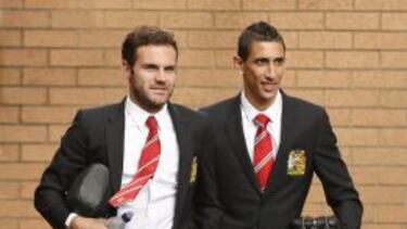 Juan Mata junto a Di María.