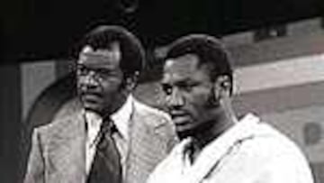 Flutch, junto a Frazier.