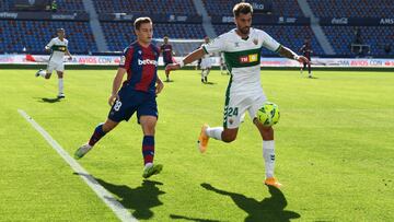 VALENCIA, SPAIN - NOVEMBER 21: Josema of Elche battles for possession with Jorge De Frutos of Levante during the La Liga Santader match between Levante UD and Elche CF at Ciutat de Valencia Stadium on November 21, 2020 in Valencia, Spain. Football Stadium