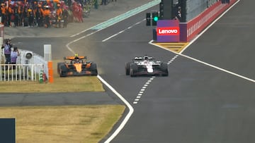 Lando Norris y Max Verstappen se encuentran en la salida del pit lane del GP de Japón de F1.