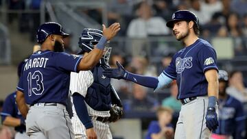 May 11, 2023; Bronx, New York, USA; Tampa Bay Rays right fielder Josh Lowe (15) celebrates his two run home run against the New York Yankees with center fielder Manuel Margot (13) during the eighth inning at Yankee Stadium. Mandatory Credit: Brad Penner-USA TODAY Sports