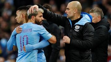 Soccer Football - Carabao Cup - Semi Final Second Leg - Manchester City v Manchester United - Etihad Stadium, Manchester, Britain - January 29, 2020 Manchester City's Sergio Aguero with manager Pep Guardiola as he was substituted for Gabriel Jesus
