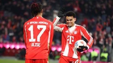 MUNICH, GERMANY - JANUARY 11: Luis Diaz of Bayern Muenchen celebrates as he scores the goal 4:1 with Michael Olise of Bayern Muenchen during the Bundesliga match between FC Bayern München and VfL Wolfsburg at Allianz Arena on January 11, 2026 in Munich, Germany. (Photo by Stefan Matzke - sampics/Getty Images)