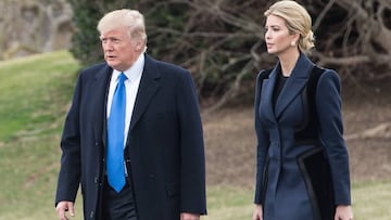 US President Donald Trump and his daughter Ivanka walk to board Marine One at the White House in Washington, DC, on February 1, 2017. / AFP PHOTO / NICHOLAS KAMM