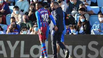 VIGO, SPAIN - NOVEMBER 06: Ansu Fati of FC Barcelona recieves medical attention during the La Liga Santander match between RC Celta de Vigo and FC Barcelona at Abanca-Balaídos on November 06, 2021 in Vigo, Spain. (Photo by Juan Manuel Serrano Arce/