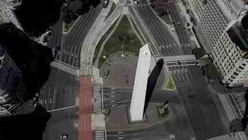 The Avenue &quot;9 de Julio&quot; is empty around the Obelisk monument in Buenos Aires, Argentina, Friday, March 20, 2020. Argentina&#039;s government has ordered residents to quarantine themselves until the end of the month to help contain the spread of COVID-19. (AP Photo/Victor R. Caivano)