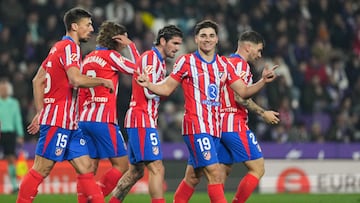 Atletico Madrid's Argentine forward #19 Julian Alvarez (C) celebrates after scoring their second goal during the Spanish league football match between Real Valladolid FC and Club Atletico de Madrid at the Jose Zorrilla stadium in Valladolid on November 30, 2024. (Photo by Cesar Manso / AFP)