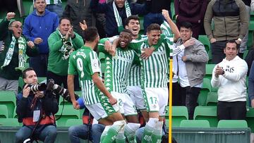 Real Betis' Spanish midfielder Joaquin (R) celebrates his goal with teammates during the Spanish league football match between Real Betis and Real Sociedad at the Benito Villamarin stadium in Seville on January 19, 2020. (Photo by CRISTINA QUICLER /