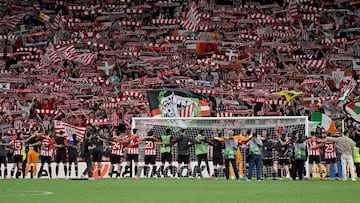 Athletic Bilbao's players celebrate victory with supporters at the end of the UEFA Europa League quarter final second leg football match between Athletic Club Bilbao and Glasgow Rangers, at the San Mames stadium in Bilbao on April 17, 2025. Athletic Club Bilbao won 2-0. (Photo by ANDER GILLENEA / AFP)