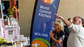 FILE PHOTO: U.S. first lady Jill Biden and Spanish chef Jose Andres greet volunteers of the World Central Kitchen association, during her visit with Spain's Queen Letizia to a reception centre for Ukrainian refugees in Pozuelo de Alarcon, on the sidelines of NATO summit, near Madrid, Spain, June 28, 2022. Oscar del Pozo/Pool via REUTERS/File Photo