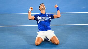 MELBOURNE, AUSTRALIA - JANUARY 27: Novak Djokovic on the ground cheering after winning the Men&#039;s Singles Final match between Novak Djokovic of Serbia and Rafael Nadal of Spain during day 14 of the 2019 Australian Open at Melbourne Park on January 27, 2019 in Melbourne, Australia. (Photo by James D. Morgan/Getty Images)