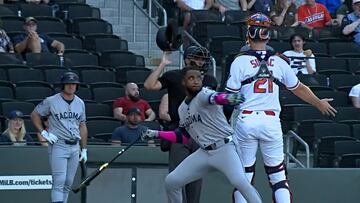 The player has been suspended and fined for launching his bat at an opponent. He is planning to appeal the decision.