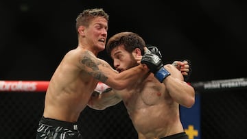 SYDNEY (Australia), 09/02/2025.- Aleksandre Topuria of Georgia (R) in his bantamweight bout against Colby Thicknesse of Australia during the UFC 312 event in Sydney, Sunday, Australia, 09 February 2025. EFE/EPA/MARK EVANS AUSTRALIA AND NEW ZEALAND OUT