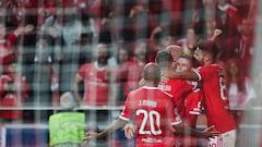 Benfica's Portuguese midfielder Rafa Silva celebrates with teammates after scoring his team's fourth goal during the UEFA Champions League 1st round day 5, Group H football match between SL Benfica and Juventus at the Luz stadium in Lisbon on October 25, 2022. (Photo by CARLOS COSTA / AFP)
