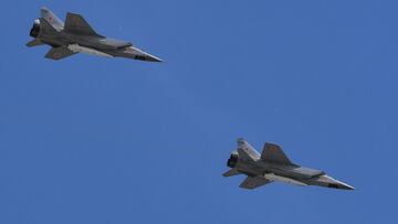 This file photo taken on May 9, 2018 shows Russia&#039;s MiG-31 supersonic interceptor jets carrying hypersonic Kinzhal (Dagger) missiles flying over Red Square during the Victory Day military parade in Moscow. 