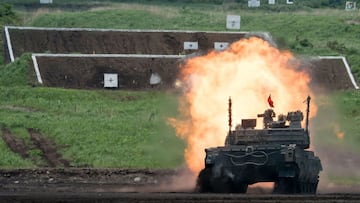 Photo by Tomohiro Ohsumi / POOL / AFP