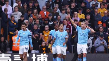 LIVERPOOL, ENGLAND - SEPTEMBER 18: Erling Haaland of Manchester City celebrates after scoring his sides second goal the Premier League match between Wolverhampton Wanderers and Manchester City at Molineux on September 17, 2022 in Wolverhampton, England. (Photo by Naomi Baker/Getty Images)