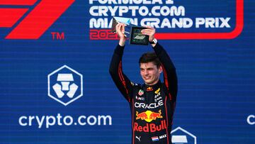 Red Bull driver Max Verstappen celebrates with his trophy after winning the Miami Grand Prix, sponsored by crypto.com.