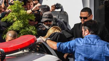 Najila Trindade Mendes de Souza (C-covered with a black jacket) arrives at the Women&#039;s Defense Precinct in Sao Paulo, Brazil on June 7, 2019. - Trindade Mendes de Souza appeared before police after saying that football superstar Neymar sexually assau