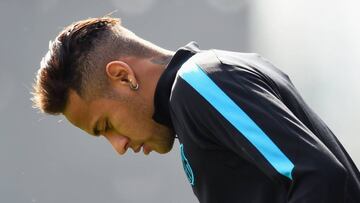 BARCELONA, SPAIN - APRIL 04:  Neymar looks thoughtful during a Barcelona training session ahead of their UEFA Champions League quarter final first leg match against Atletico Madrid at San Joan Despi training ground on April 4, 2016 in Barcelona, Spain.  (