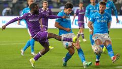 Fiorentina's French forward #11 Jonathan Ikone (L) shoots the ball during the Italian Super Cup semi final football match between Napoli and Fiorentina at Al-Awwal Park Stadium in Riyadh, on January 18, 2024. (Photo by Fayez NURELDINE / AFP)