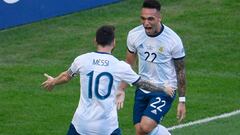 (FILES) In this file photo taken on June 28, 2019 Argentina&#039;s Lautaro Martinez (R) celebrates with teammate Lionel Messi after scoring against Venezuela during their Copa America football tournament quarter-final match at Maracana Stadium in Rio de Janeiro, Brazil. - The new Argentinian national football team is trying to build new football societies that match the power of Lionel Messi and the freshness and audacity of Lautaro Martinez and other young players. (Photo by Mauro PIMENTEL / AFP)