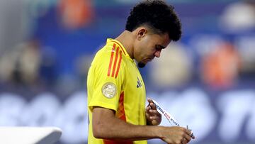 Soccer Football - Copa America 2024 - Final - Argentina v Colombia - Hard Rock Stadium, Miami, Florida, United States - July 15, 2024 Colombia's Luis Diaz looks dejected after collecting his runners up medal after the match REUTERS/Agustin Marcarian