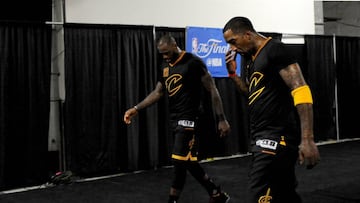 OAKLAND, CA - JUNE 12: LeBron James #23 and JR Smith #5 of the Cleveland Cavaliers walk to the locker room following their 129-120 loss in Game 5 to lose the 2017 NBA Finals to the Golden State Warriors at ORACLE Arena on June 12, 2017 in Oakland, California. NOTE TO USER: User expressly acknowledges and agrees that, by downloading and or using this photograph, User is consenting to the terms and conditions of the Getty Images License Agreement.   Robert Reiners/Getty Images/AFP
 == FOR NEWSPAPERS, INTERNET, TELCOS &amp; TELEVISION USE ONLY ==