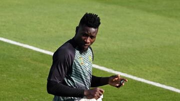 Cameroon's goalkeeper Andre Onana takes part in a training session at the Al Sailiya SC Training Site in Doha on November 27, 2022, on the eve of the Qatar 2022 World Cup football match between Cameroon and Serbia. (Photo by ISSOUF SANOGO / AFP)