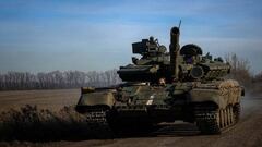 A Ukrainian tank runs on a road near Bakhmut, in the Donetsk region, on December 2, 2022, amid the Russian invasion of Ukraine. (Photo by ANATOLII STEPANOV / AFP) (Photo by ANATOLII STEPANOV/AFP via Getty Images)