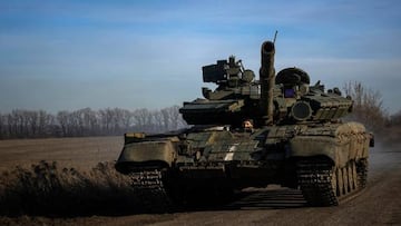 A Ukrainian tank runs on a road near Bakhmut, in the Donetsk region, on December 2, 2022, amid the Russian invasion of Ukraine. (Photo by ANATOLII STEPANOV / AFP) (Photo by ANATOLII STEPANOV/AFP via Getty Images)